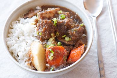 Galbi jjim (braised short ribs) in a bowl along with rice.
