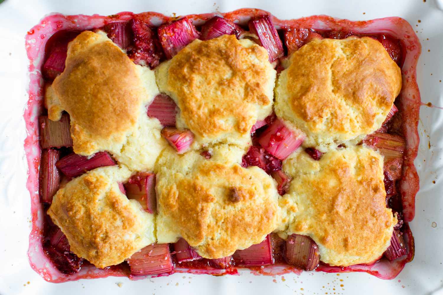 Baked Rhubarb and Strawberry Cobbler in a Casserole Dish