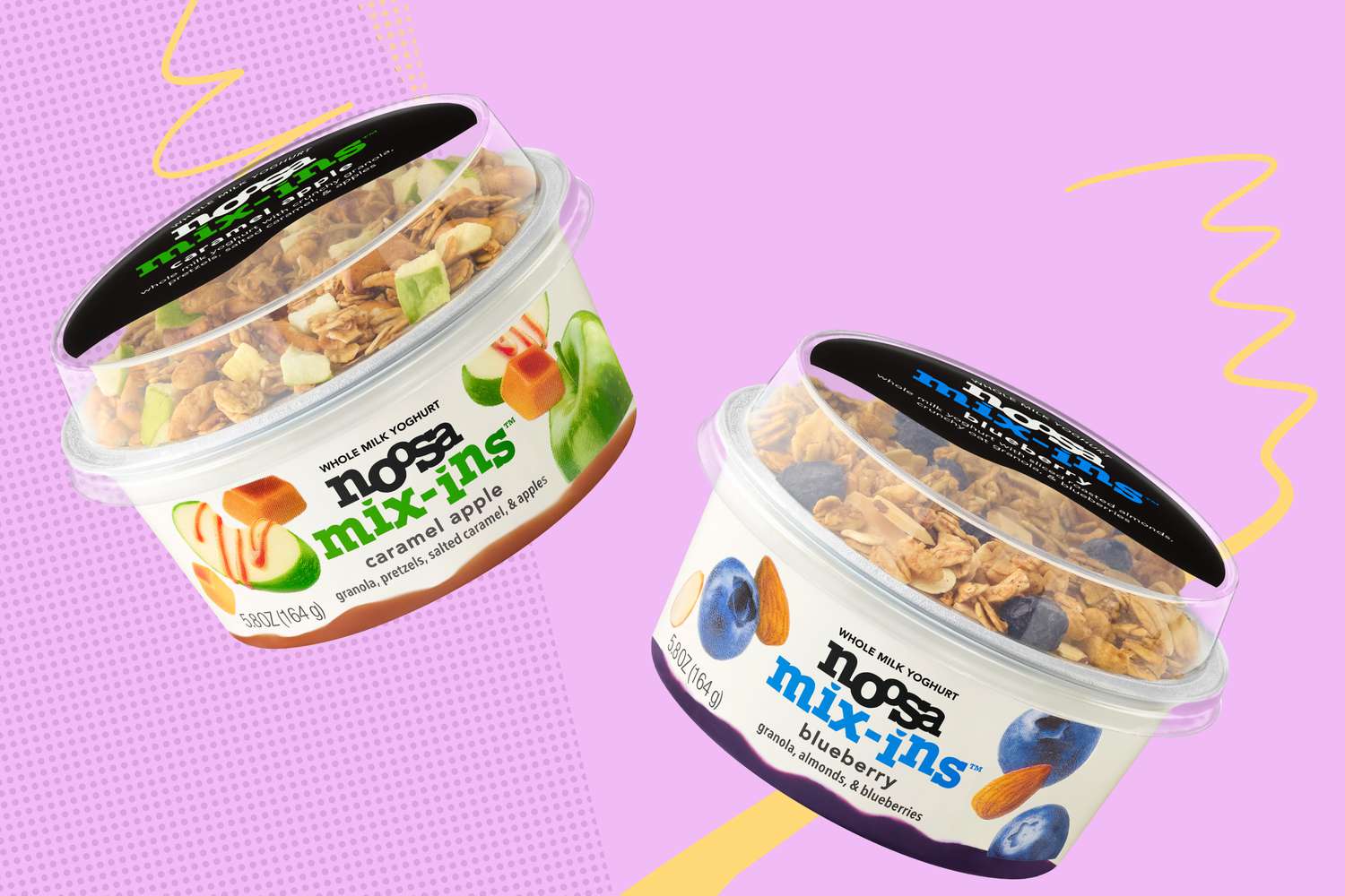 Two Noosa yogurt containers with toppings labeled mix-ins, flavors appear to be caramel apple and blueberry