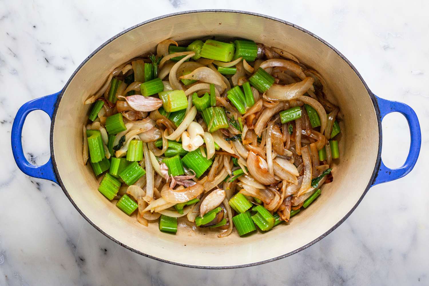 Onions, Celery, and Garlic in a Dutch Oven for Jewish Brisket Recipe