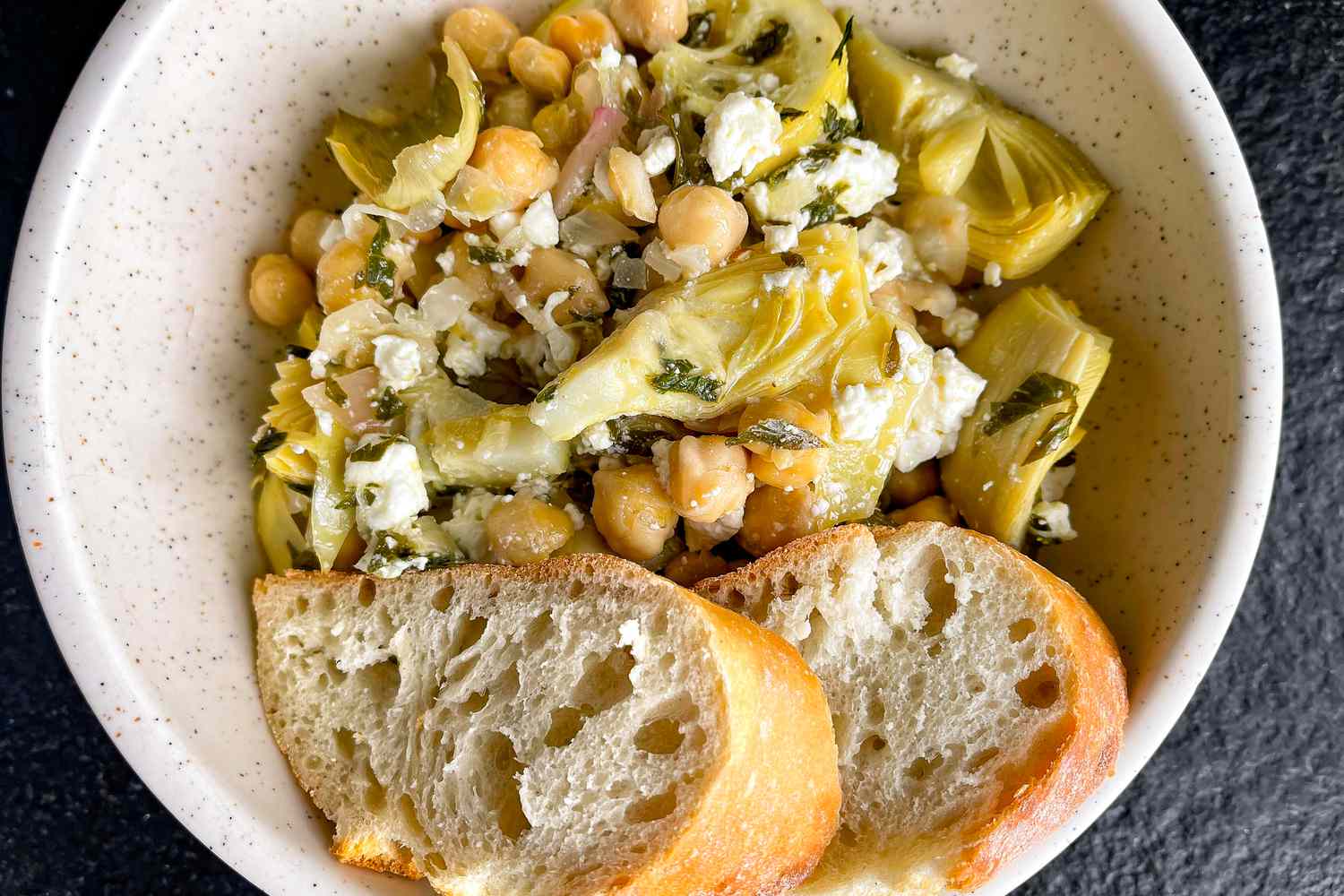 Bowl of roasted artichokes and chickpeas