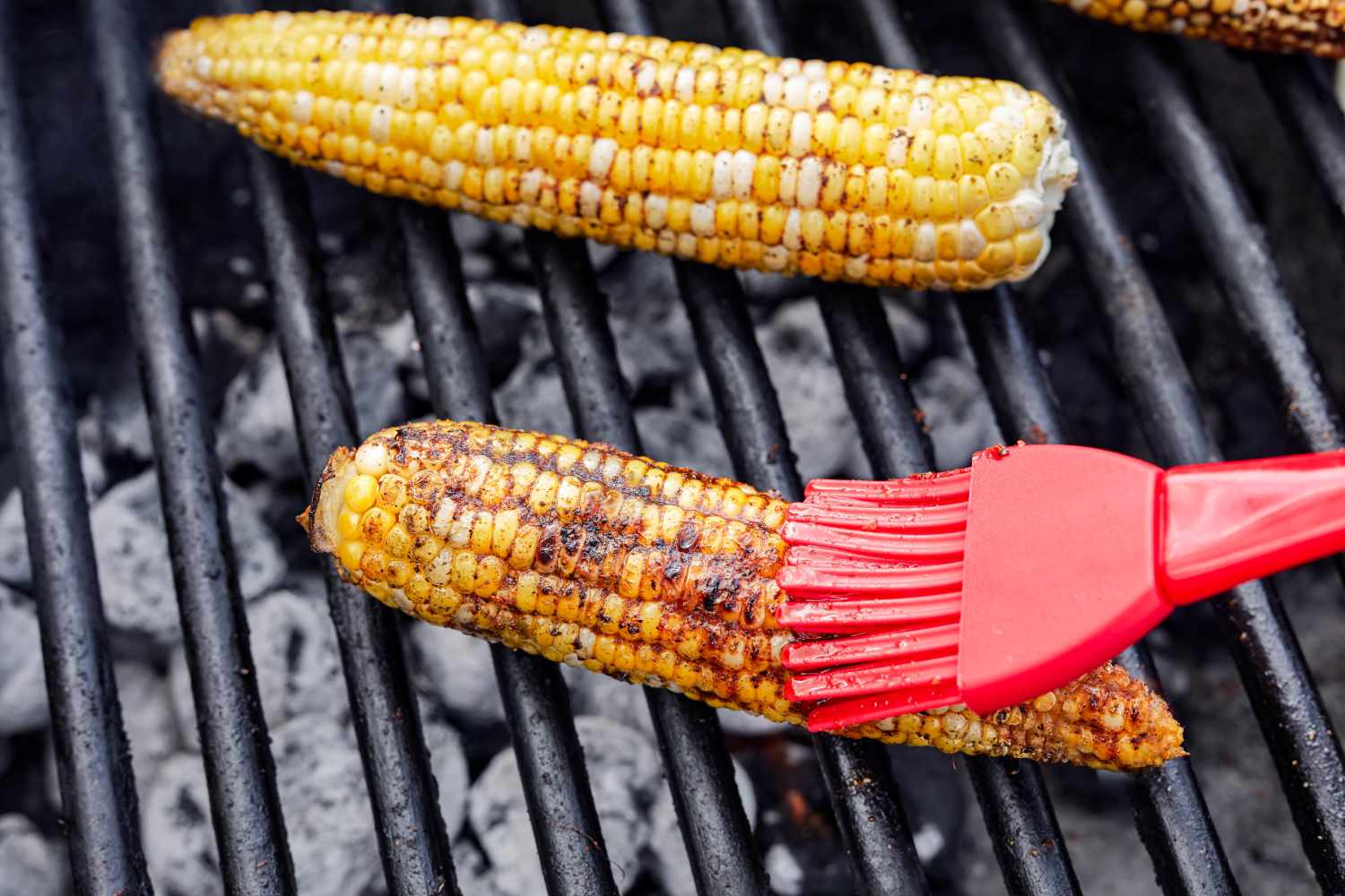 Cajun-Spiced Grilled Corn Basted with Butter on the Grill