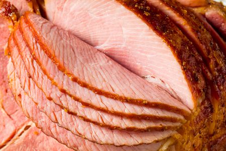 Glazed ham cut into slices