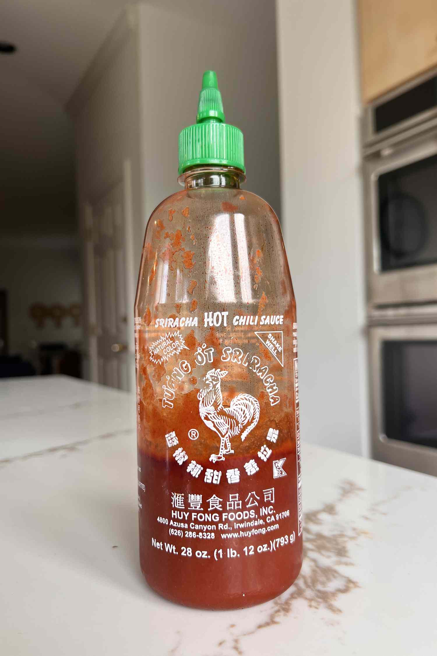 Sriracha on kitchen counter