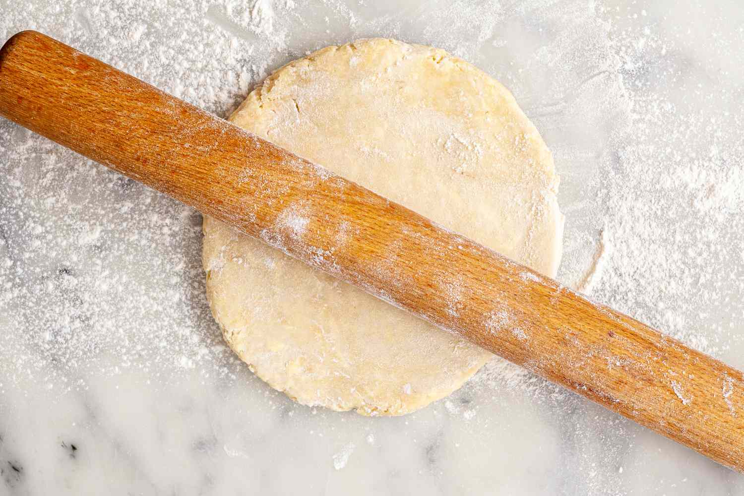 Rolling out an easy pie crust.