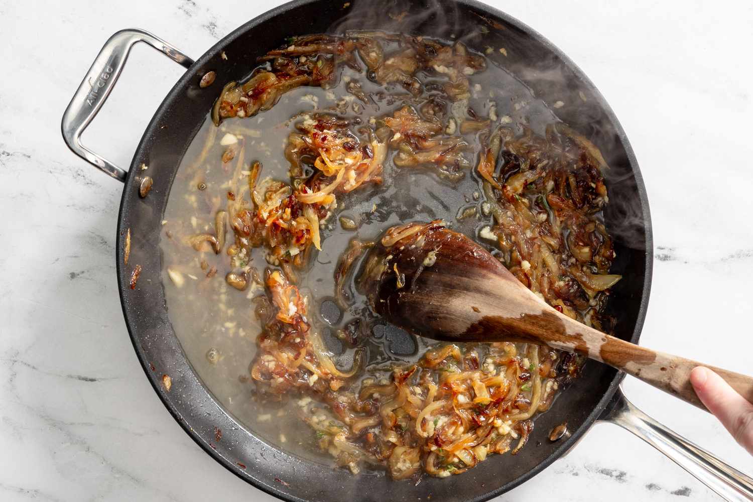 pot deglazed with white whine for French onion pasta recipe