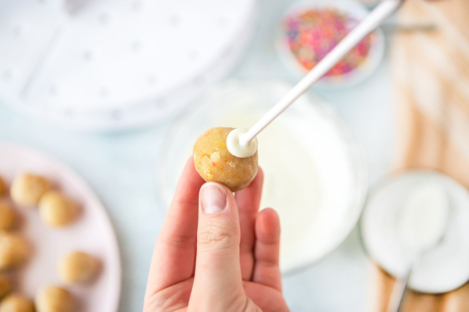 Confetti Cake Pop Attached to Stick with Chocolate 