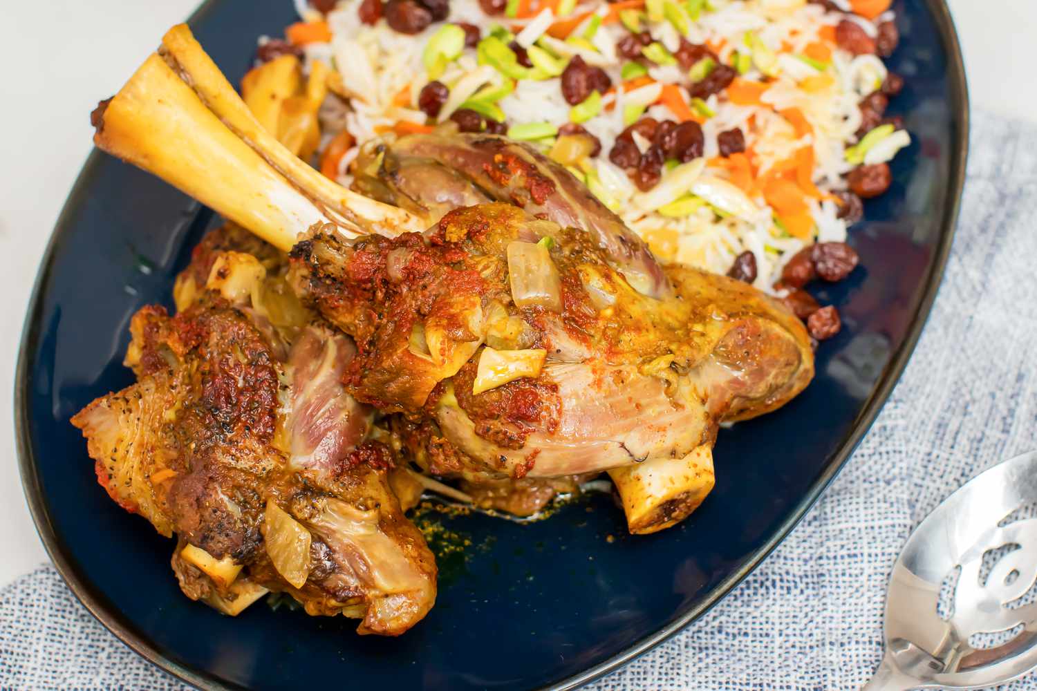 Kabuli Palao (Afghan Lamb Shanks with Rice, Carrots, and Raisins)