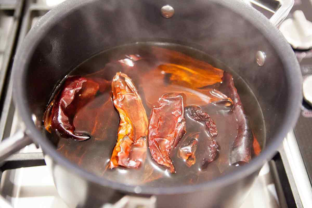 Red chilis soaking in hot water