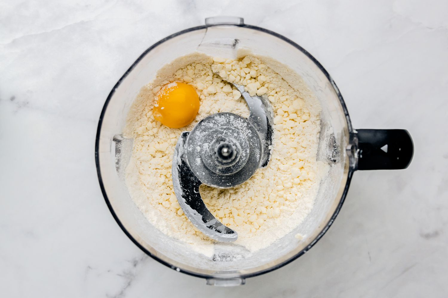 Egg and Dry Ingredients in Food Processor for Lemon Bars Recipe
