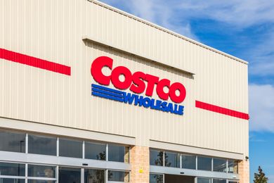 Front exterior of a Costco Wholesale store with its logo displayed