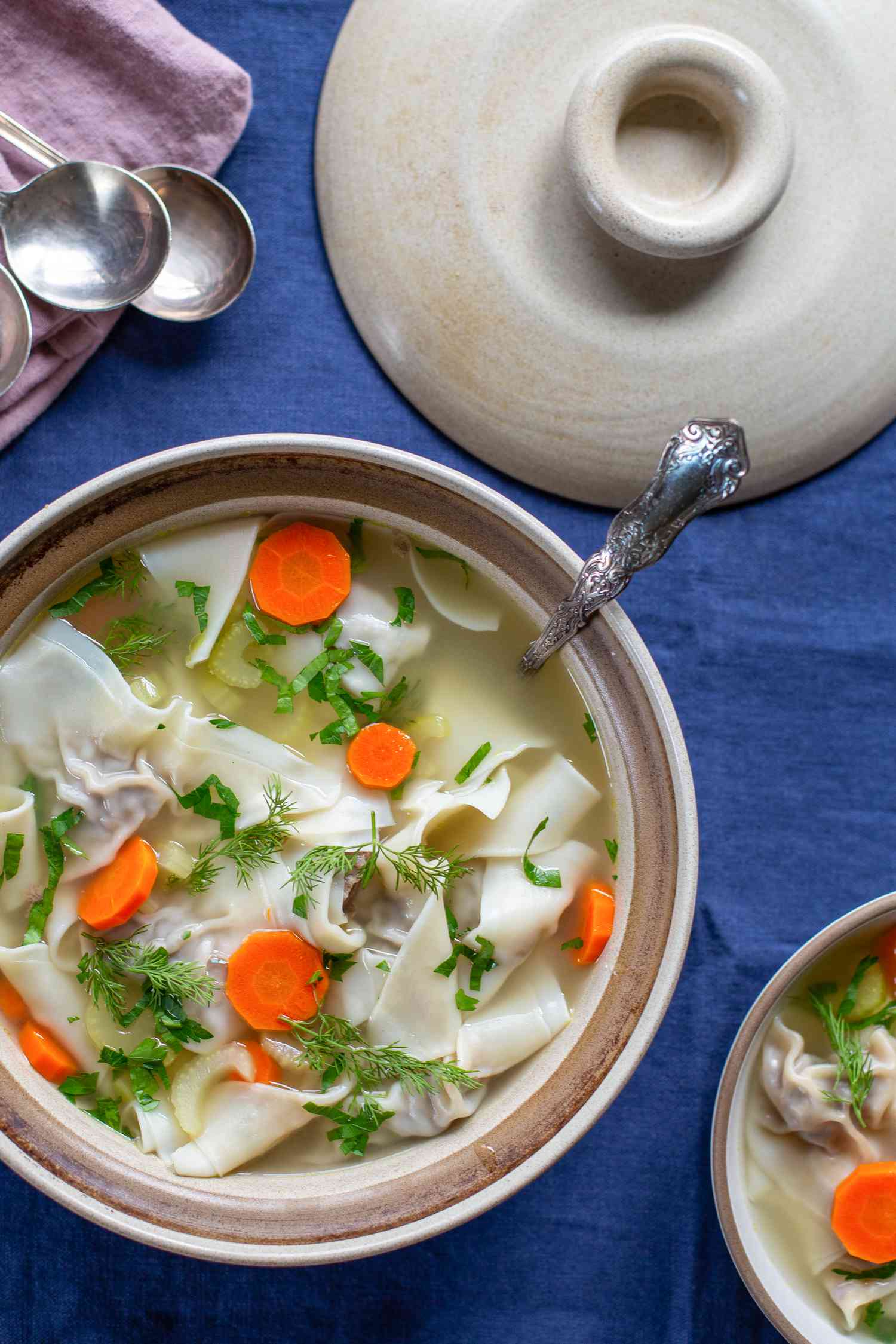 Easy beef kreplach in chicken broth with carrots and celery 