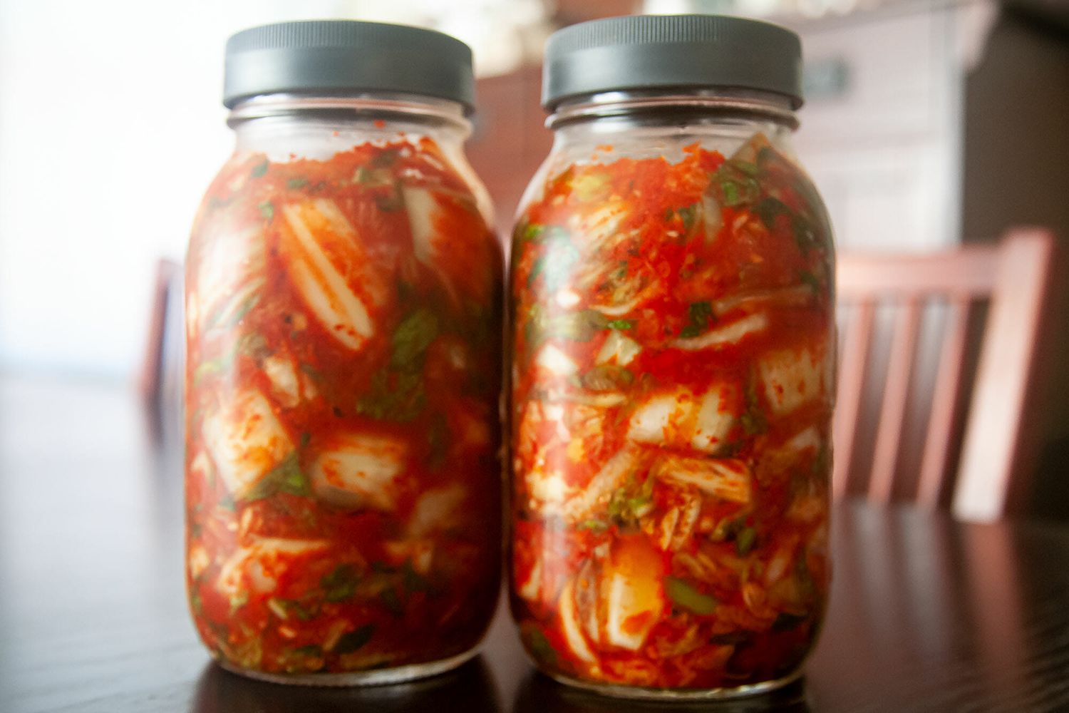 Two jars filled iwth a Korean Kimchi recipe.