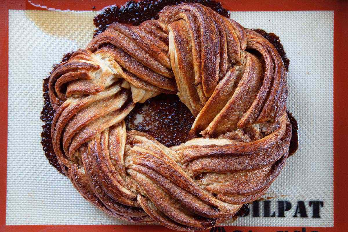 Easy King Cake golden brown and cooling on a silpat.