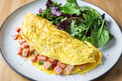 Denver Omelet with Mixed Greens on Plate 