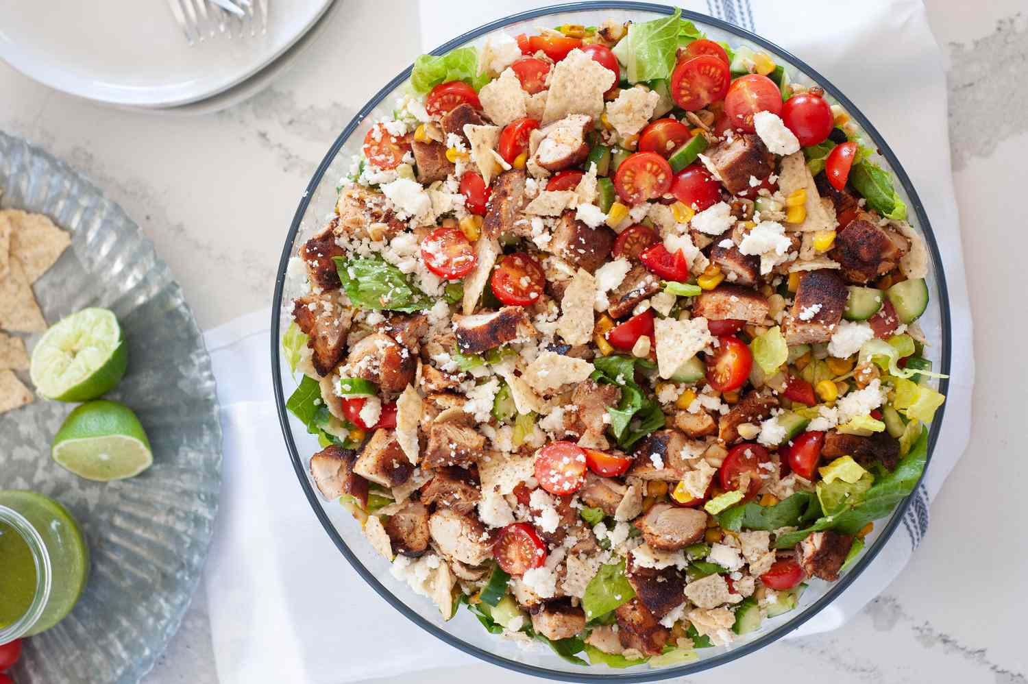 Tex-Mex Chopped Chicken Salad with Corn, Tortilla Chips, and Cojita