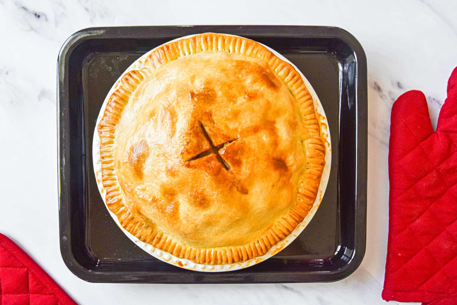 Bake Homemade Apple Pie on Top of Baking Tray 