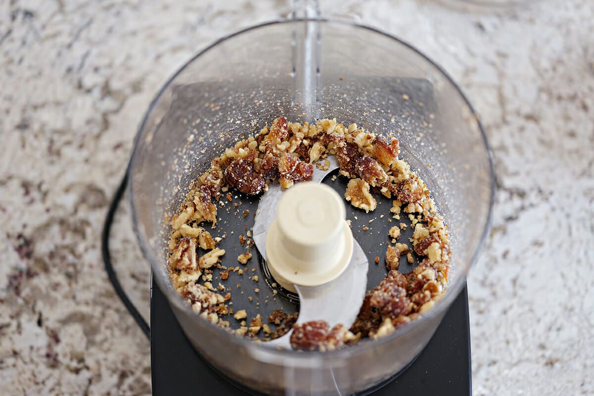 Date almond butter coconut balls pulse the dates and walnuts