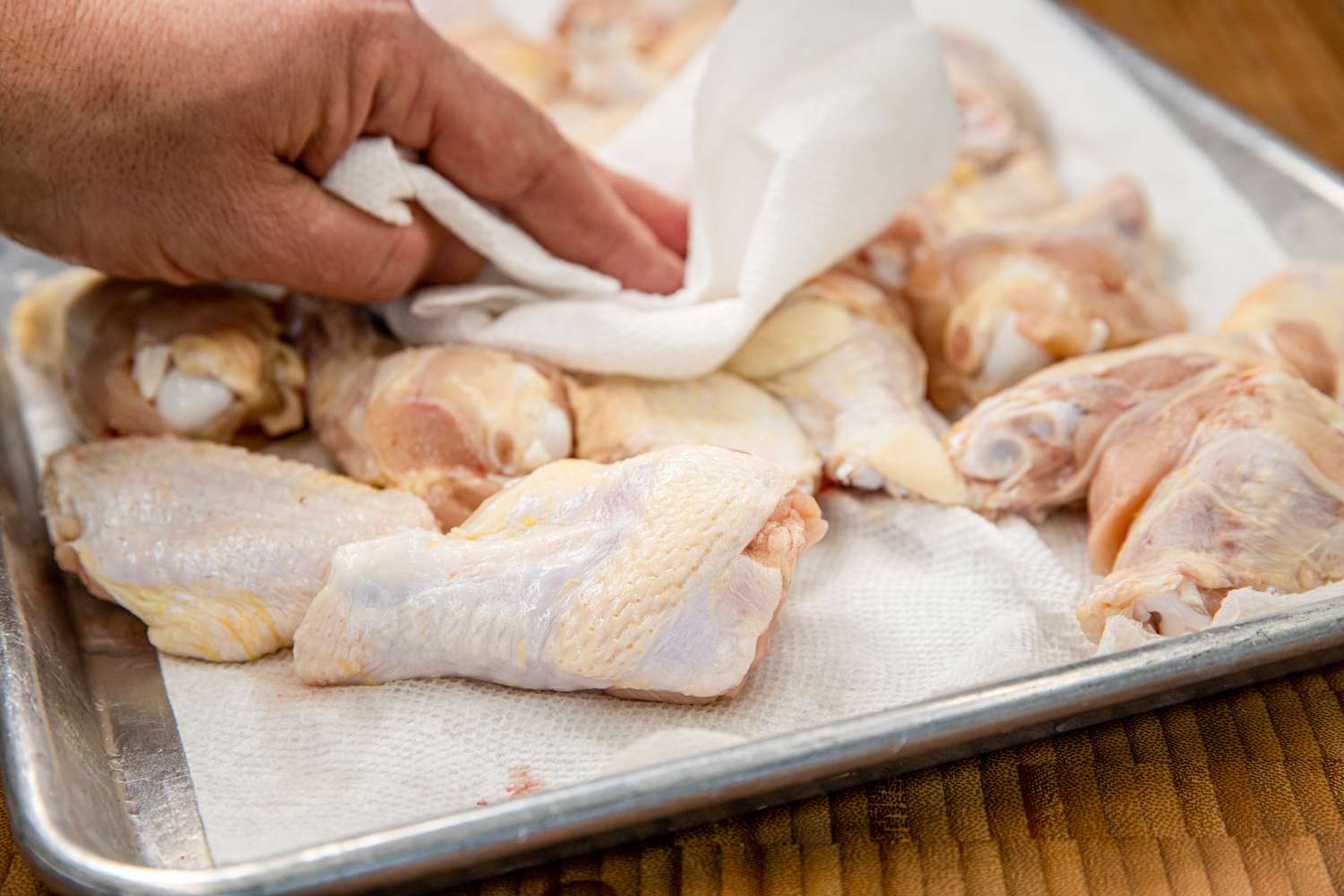 Pat Dry Chicken Wings with Paper Towel for Smoked Chicken Wings Recipe