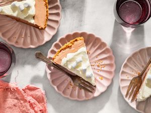 Granny’s Party Pie slices on dessert plates with forks and beverage glasses