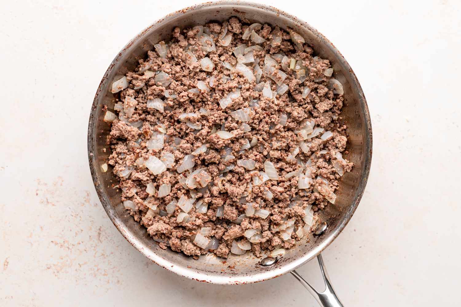 Browned beef for a baked ziti recipe.