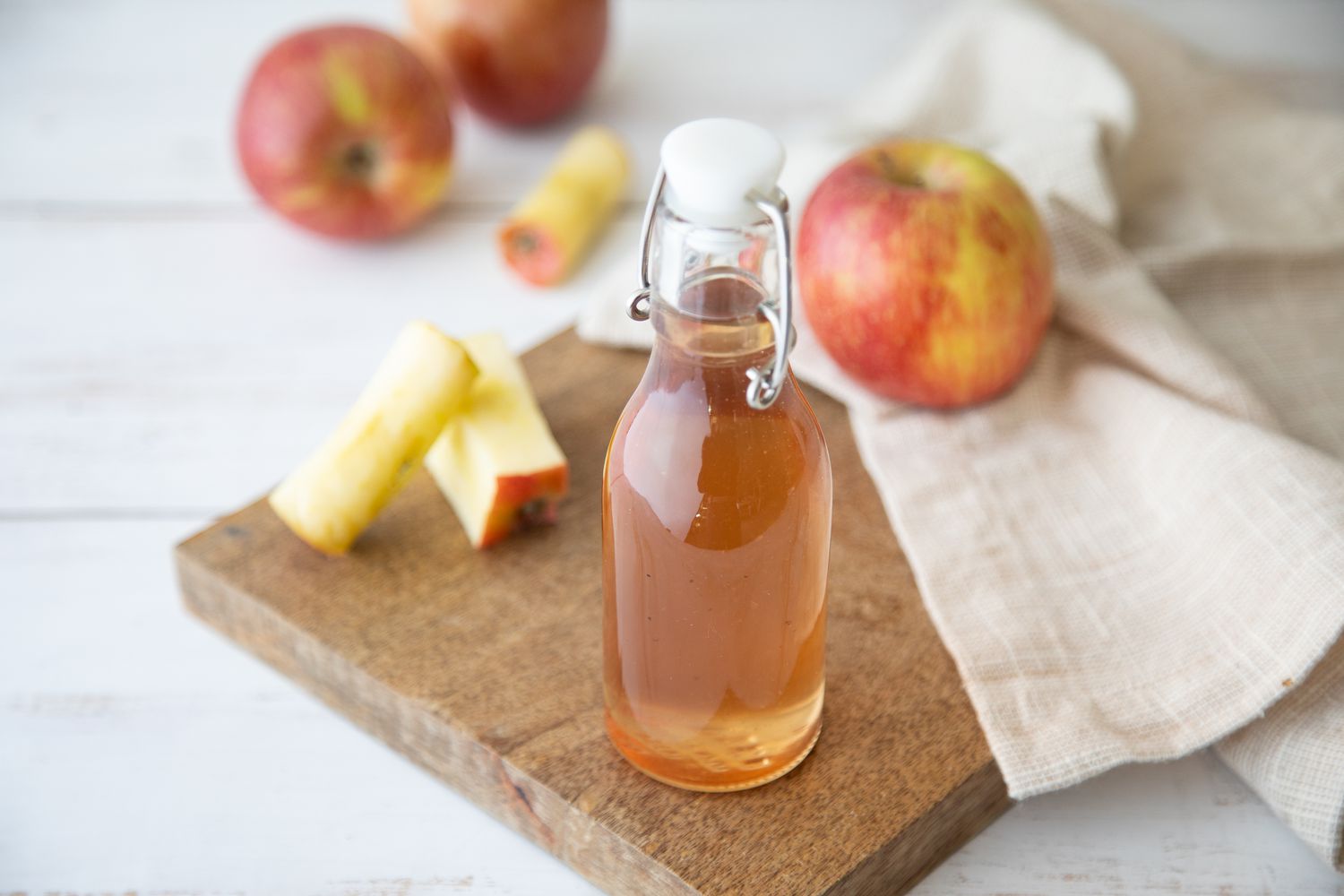 Spiced apple core simple syrup in swing top bottle