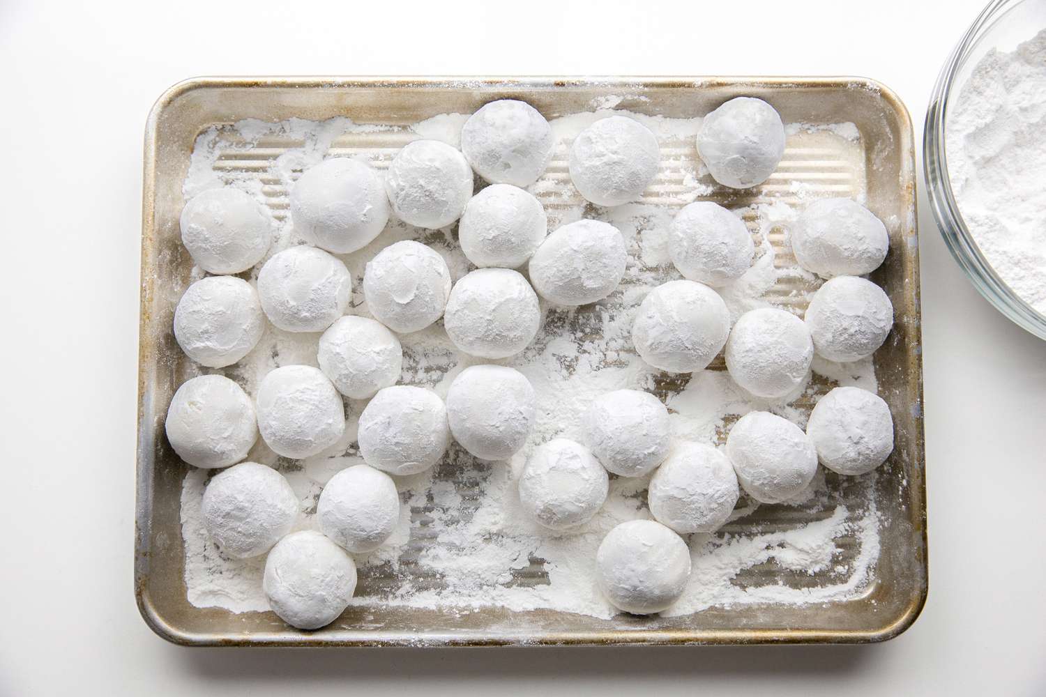 Tangyuan on a Sheet Pan after Coated with More Rice Flour