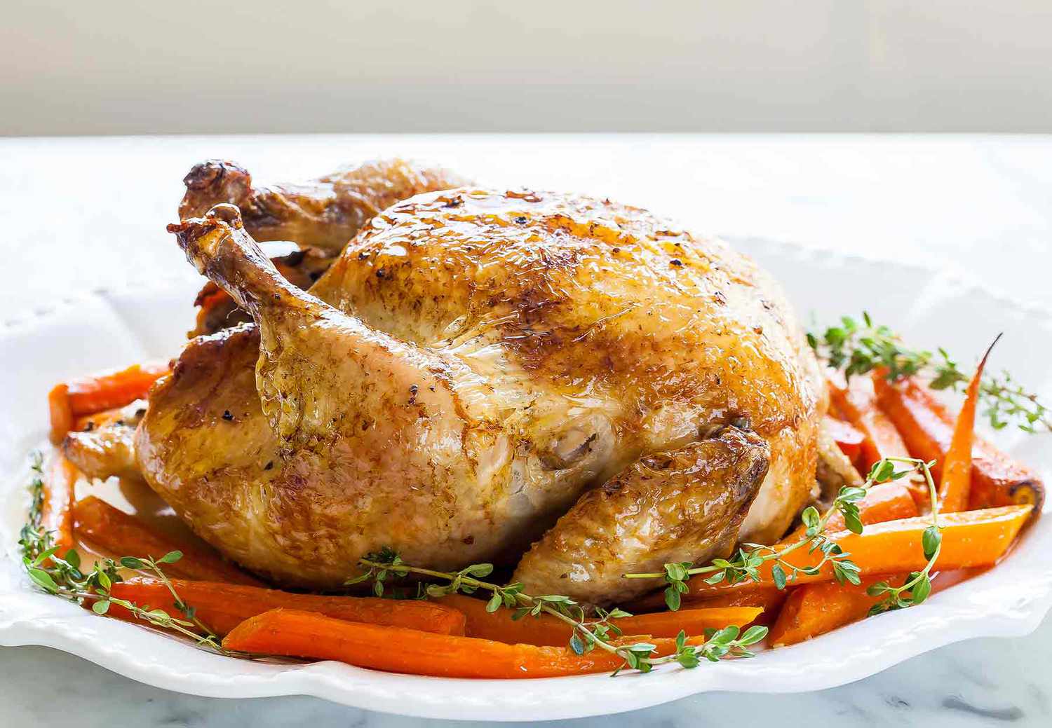 Roasted Chicken with Carrots and Sprigs of Fresh Thyme