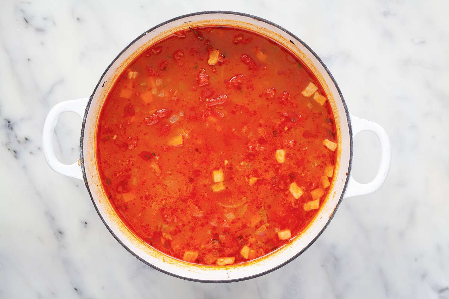 Broth added tomatoes for classic tomato sauce