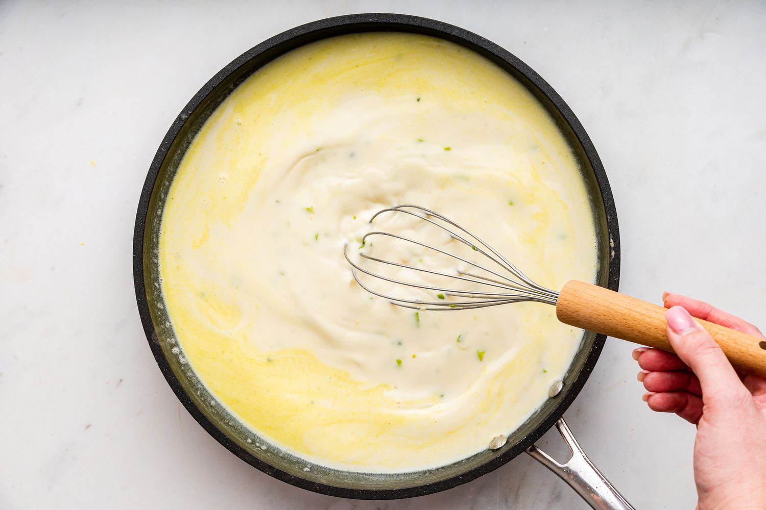 sauce whisked together in the pan for easy chicken primavera recipe