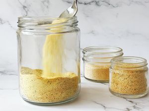 Homemade adobo seasoning in clear jar