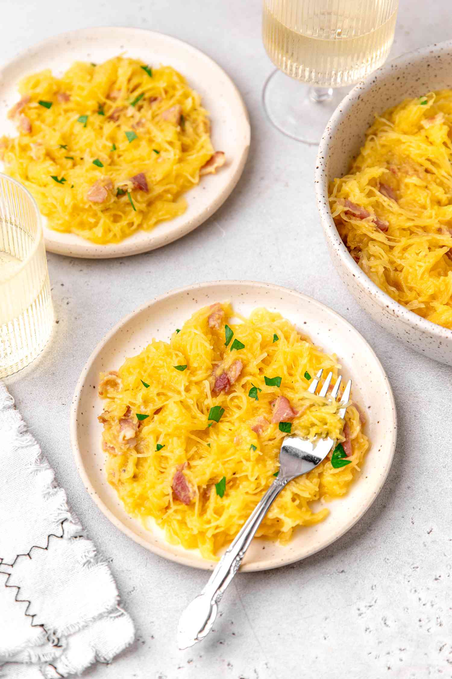 Spaghetti Squash Carbonara on Two Plates and More in a Bowl 