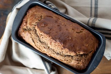 Whole Banana Bread in loaf pan.