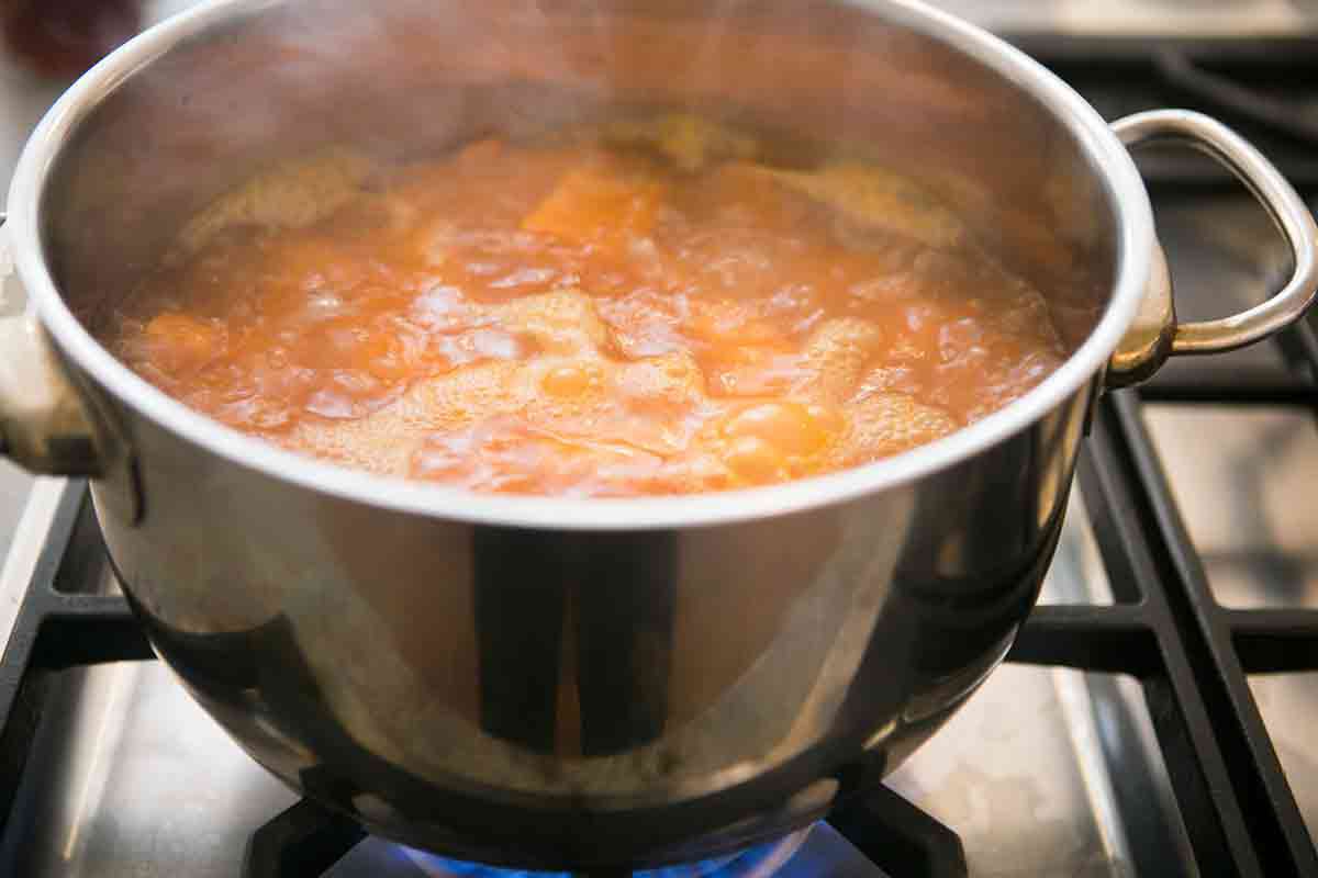 sweet potatoes boiling in a pot