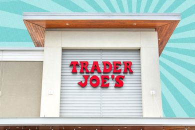 Trader Joe's storefront exterior with red sign and decorative paneling shown