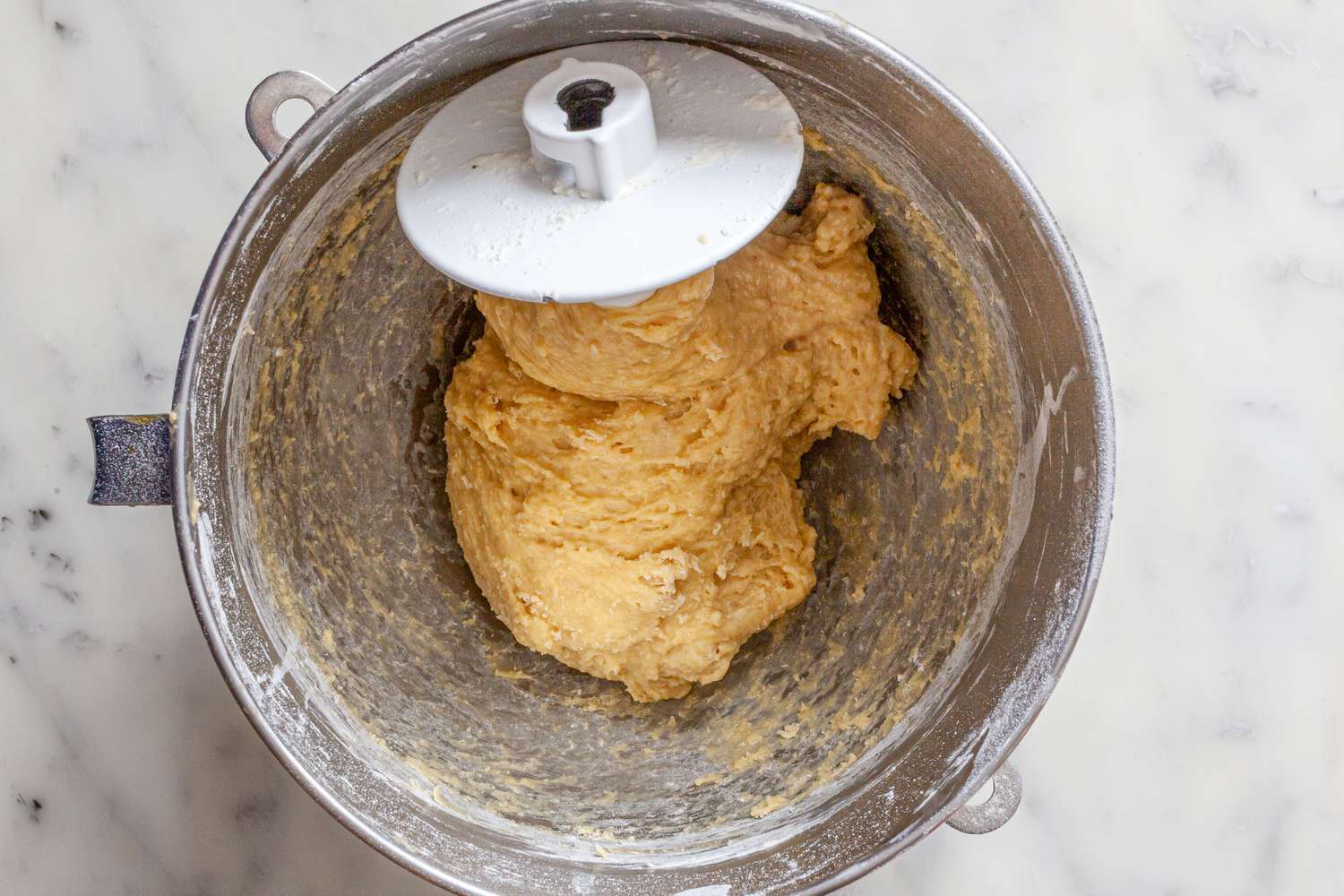 Cinnamon Swirl Raisin Brioche Loaf Dough Mixed Together Using a Dough Hook