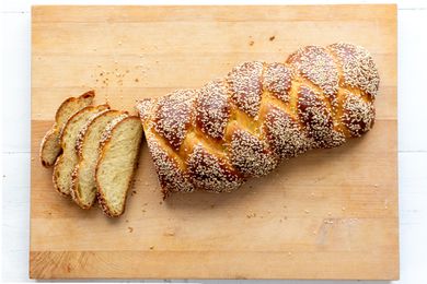 sliced challah on cutting board