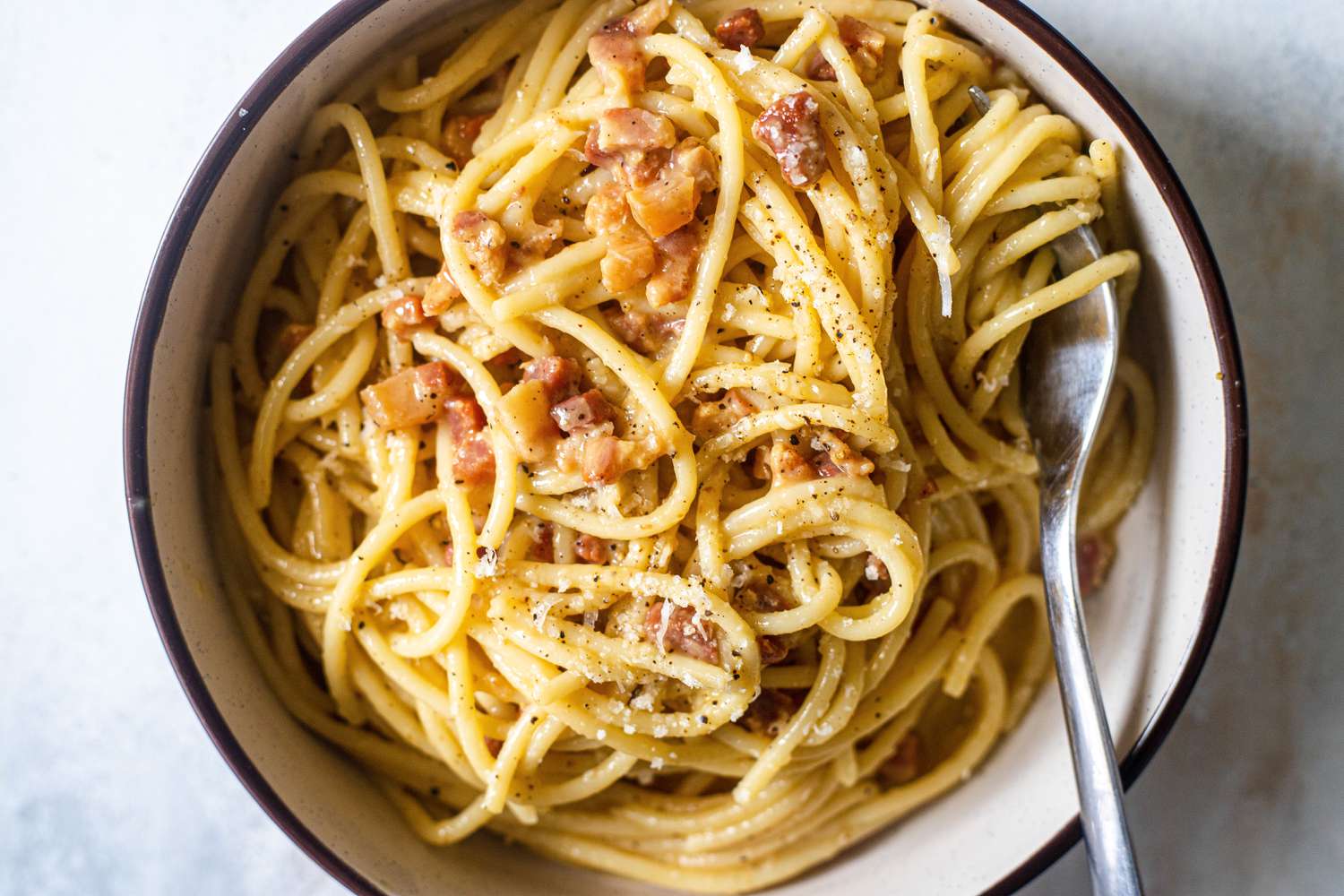 Overhead view of a bowl of Spaghetti Carbonara.