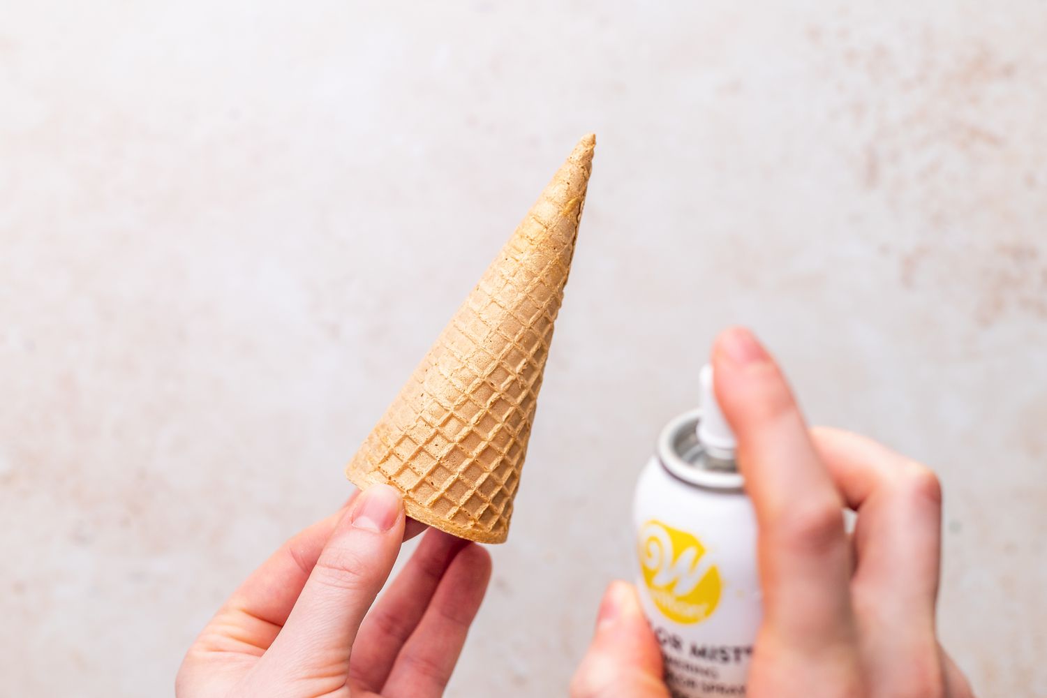 Edible Gold Spray Used on Sugar Cone for Unicorn Cake Recipe