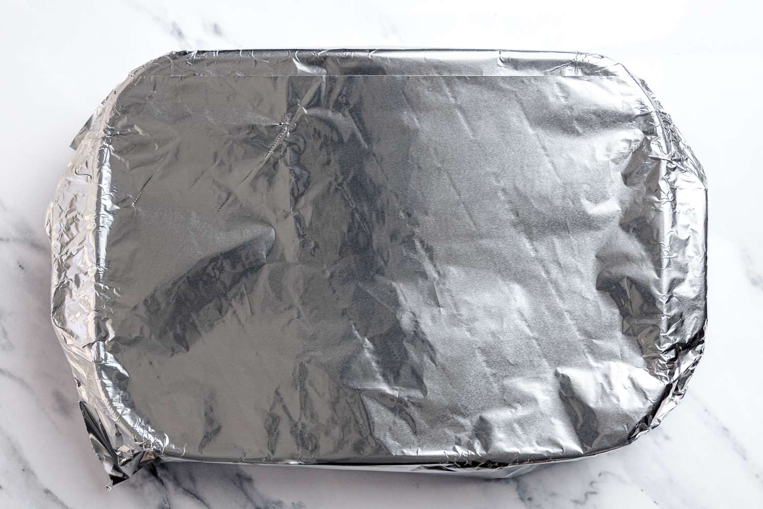 Casserole Dish Wrapped With Aluminum Foil
