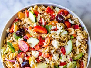 Greek Pasta Salad in a white serving bowl