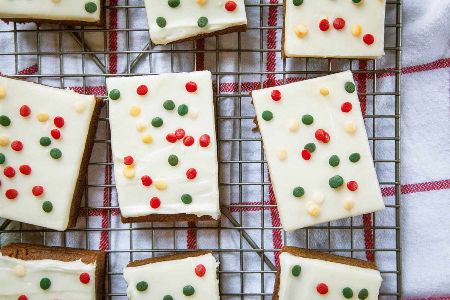 Overhead view of cream cheese gingerbread bars on a cooling rack