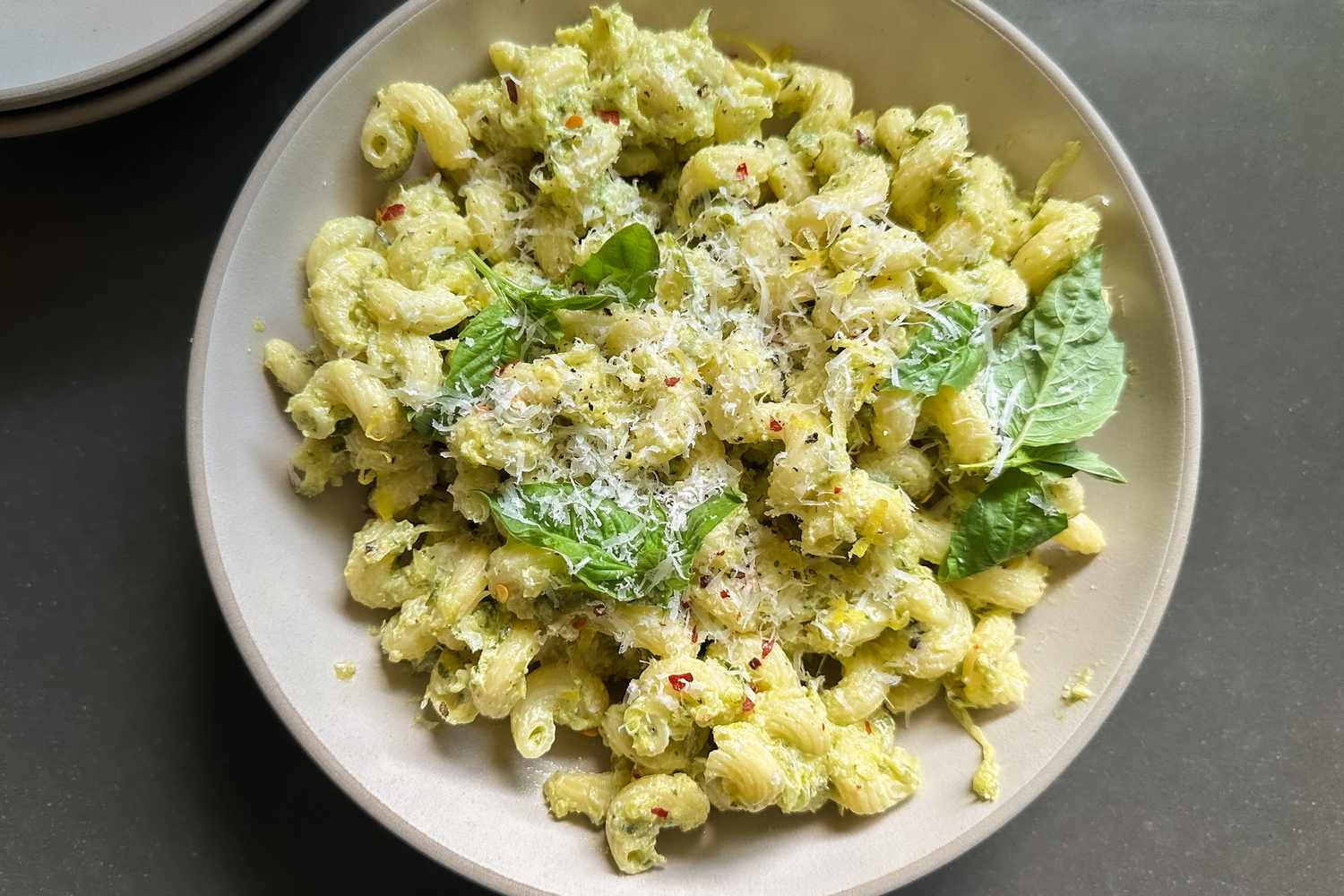 5-ingredient lemony zucchini pasta in a bowl garnished with basil