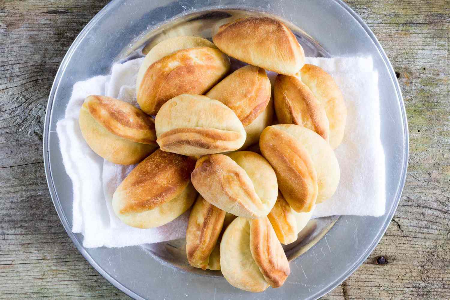 Parker House Rolls on a Silver Plate