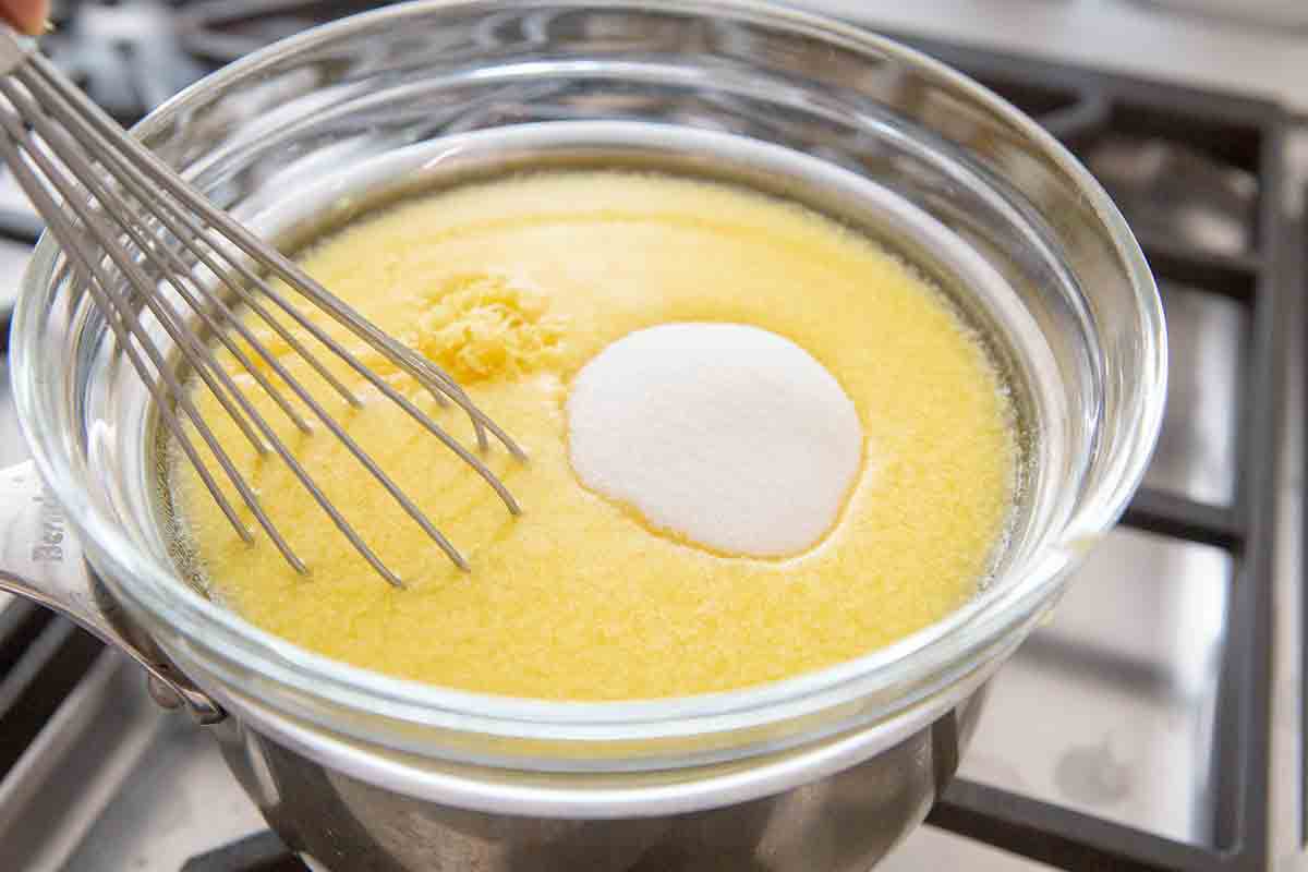 Heat lemon tart filling mixture over double boiler