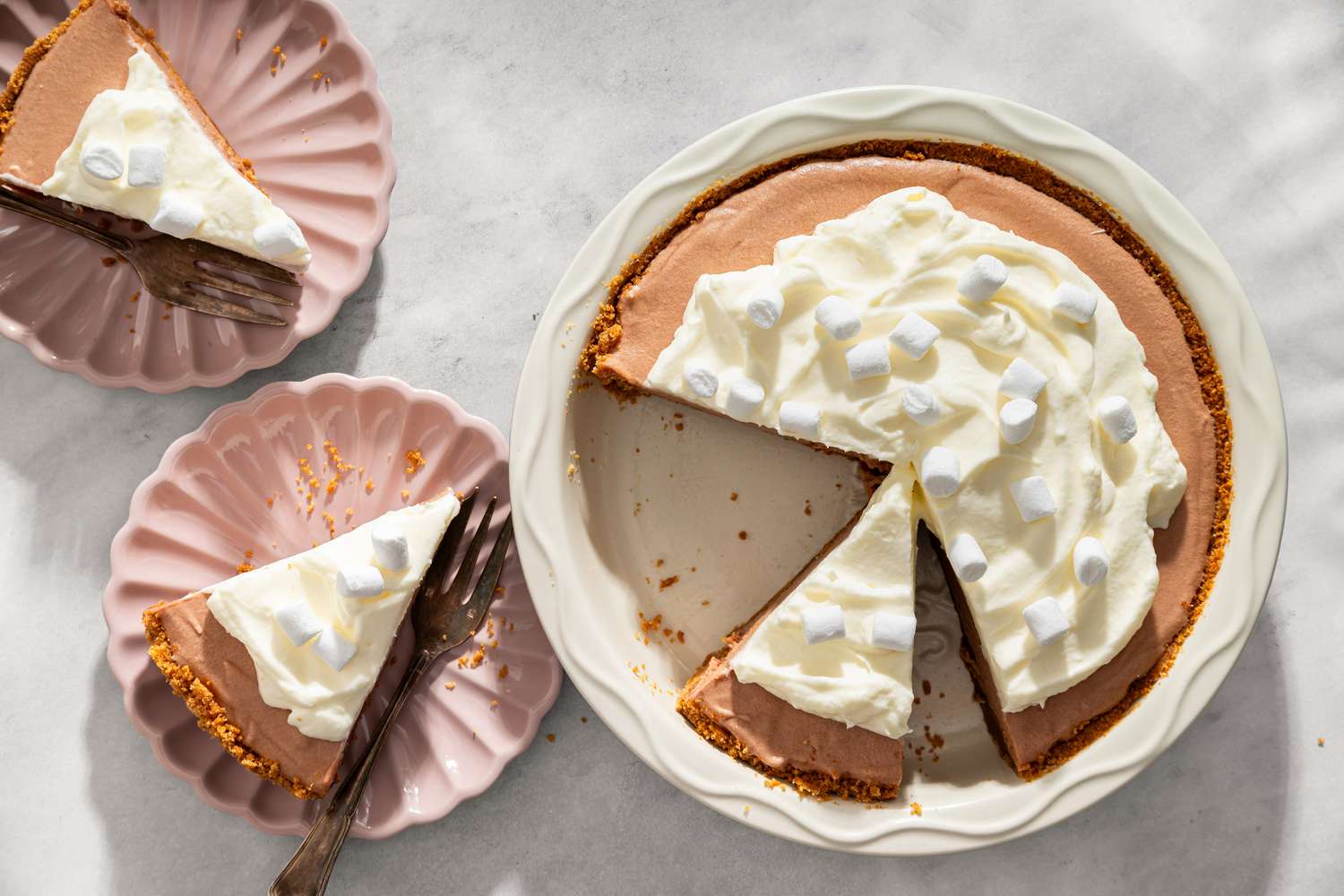 overhead view of Granny’s Party Pie with slices cut out and 2 dessert plates with slices of the pie