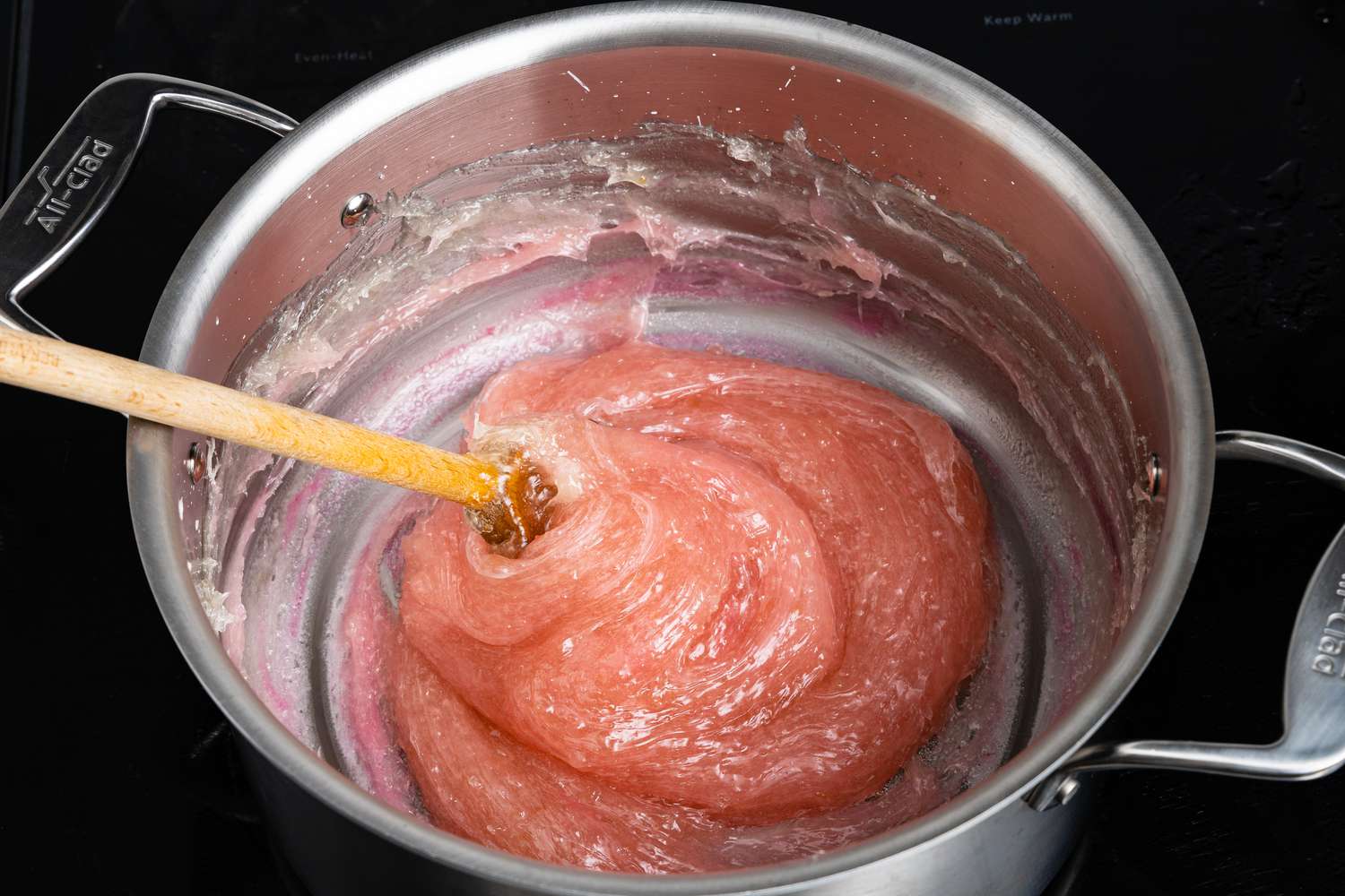 Rose Water and Pink Food Coloring Mixed Into Turkish Delight Using Wooden Spoon 