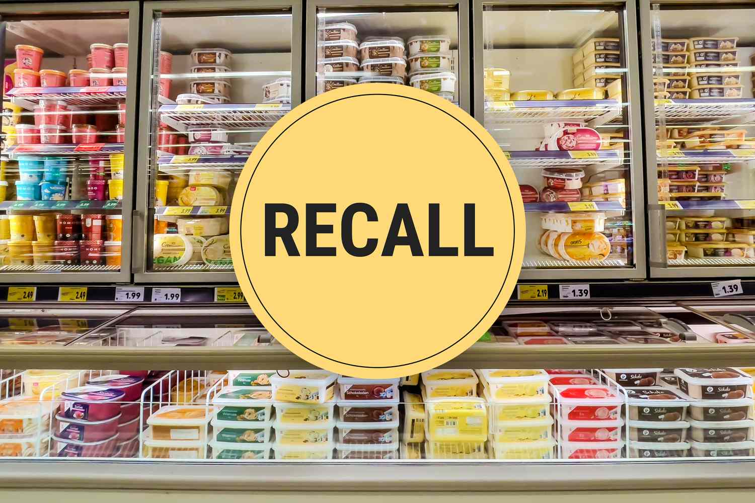 Supermarket freezer section with recall notice over packaged food items