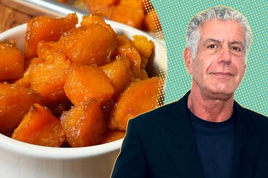 Anthony Bourdain next to a bowl of cooked sweet potatoes