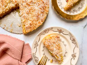 Coconut Macaroon Cake on a dessert plate with a fork